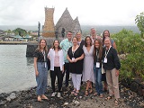 Participants at the International Coral Reef Initiative’s General Meeting stand in front of a restored Hawaiian religious temple. Credit - NOAA